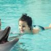 father-and-daughter-swimming-with-dolphins-in-dubai-850×459